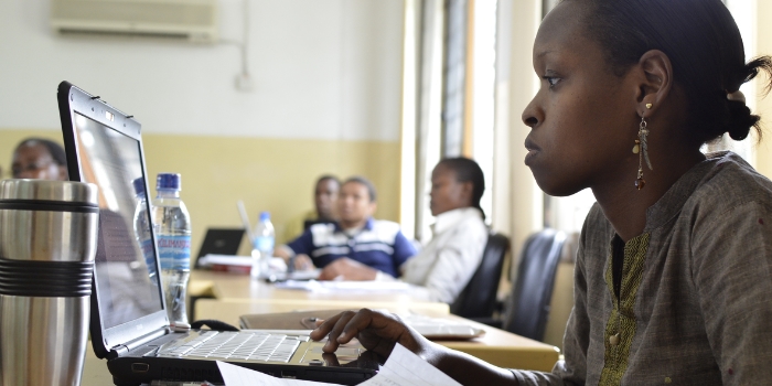 Female student practicing on computer in Dar es Salaam, Tanzania