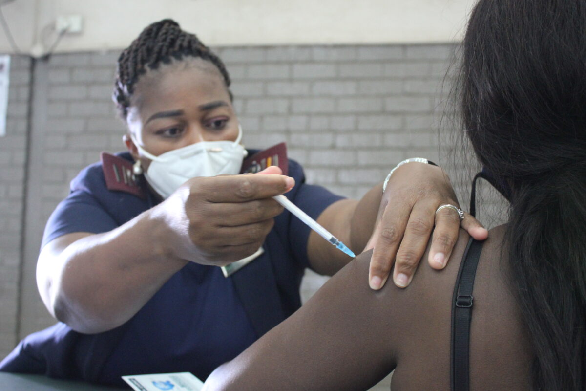 A nurse administering the vaccination in a community hall in west Pretoria, South Africa.