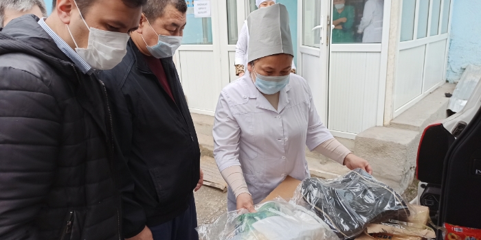 Hospital staff in Osh, Kyrgyzstan, receive much-needed protective clothing for the next ten days
